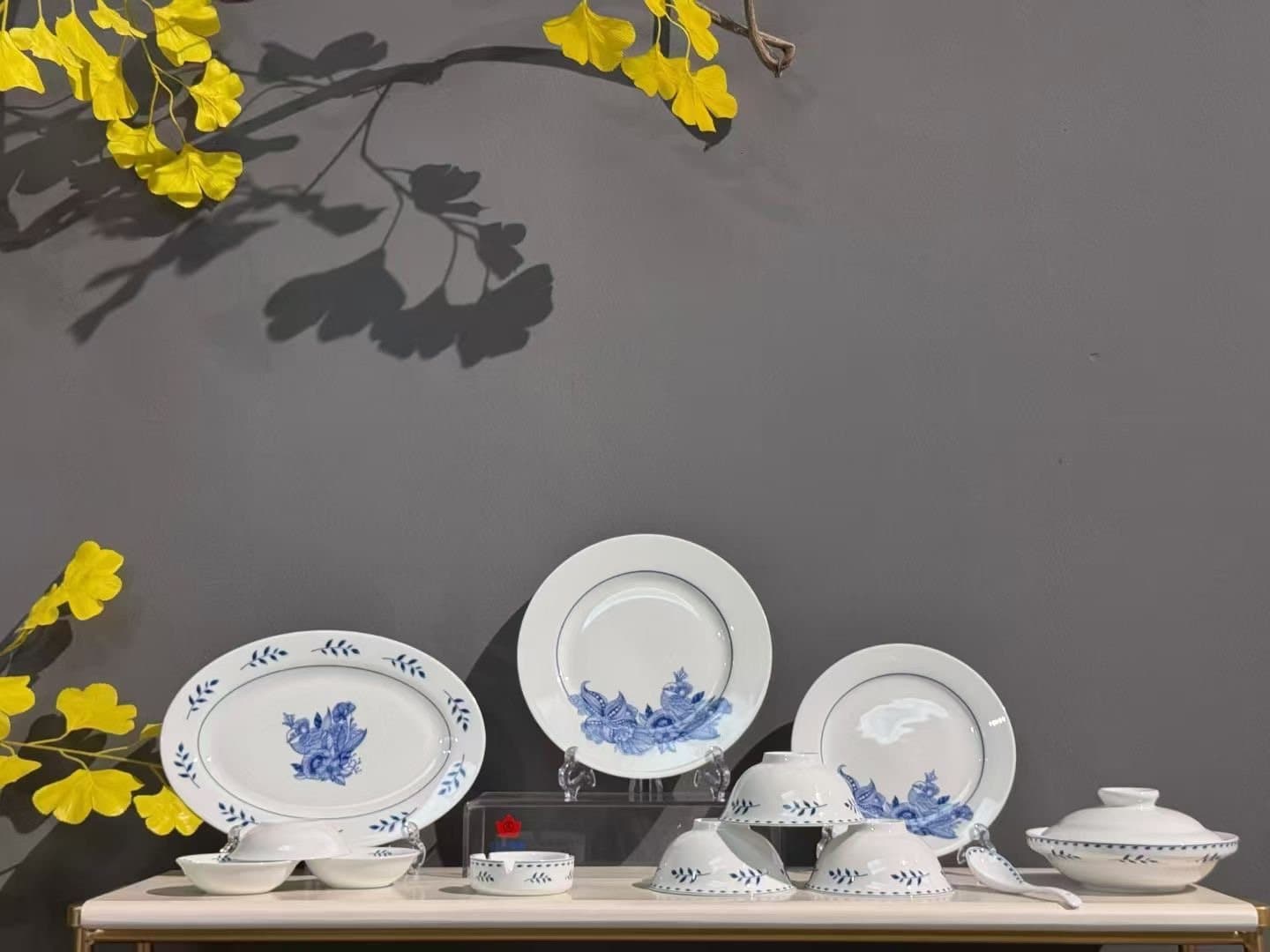 Blue florals, loose and unhurried, on bright white.